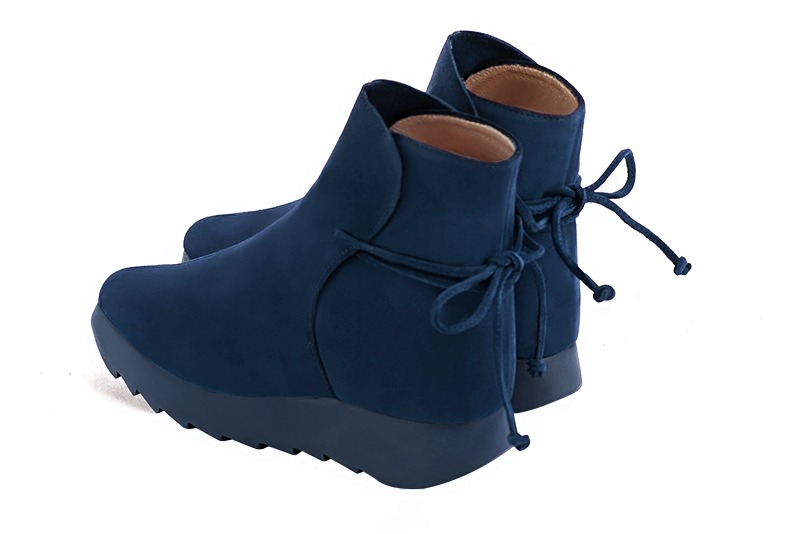 Navy blue women's ankle boots with laces at the back. Square toe. Low rubber soles. Rear view - Florence KOOIJMAN